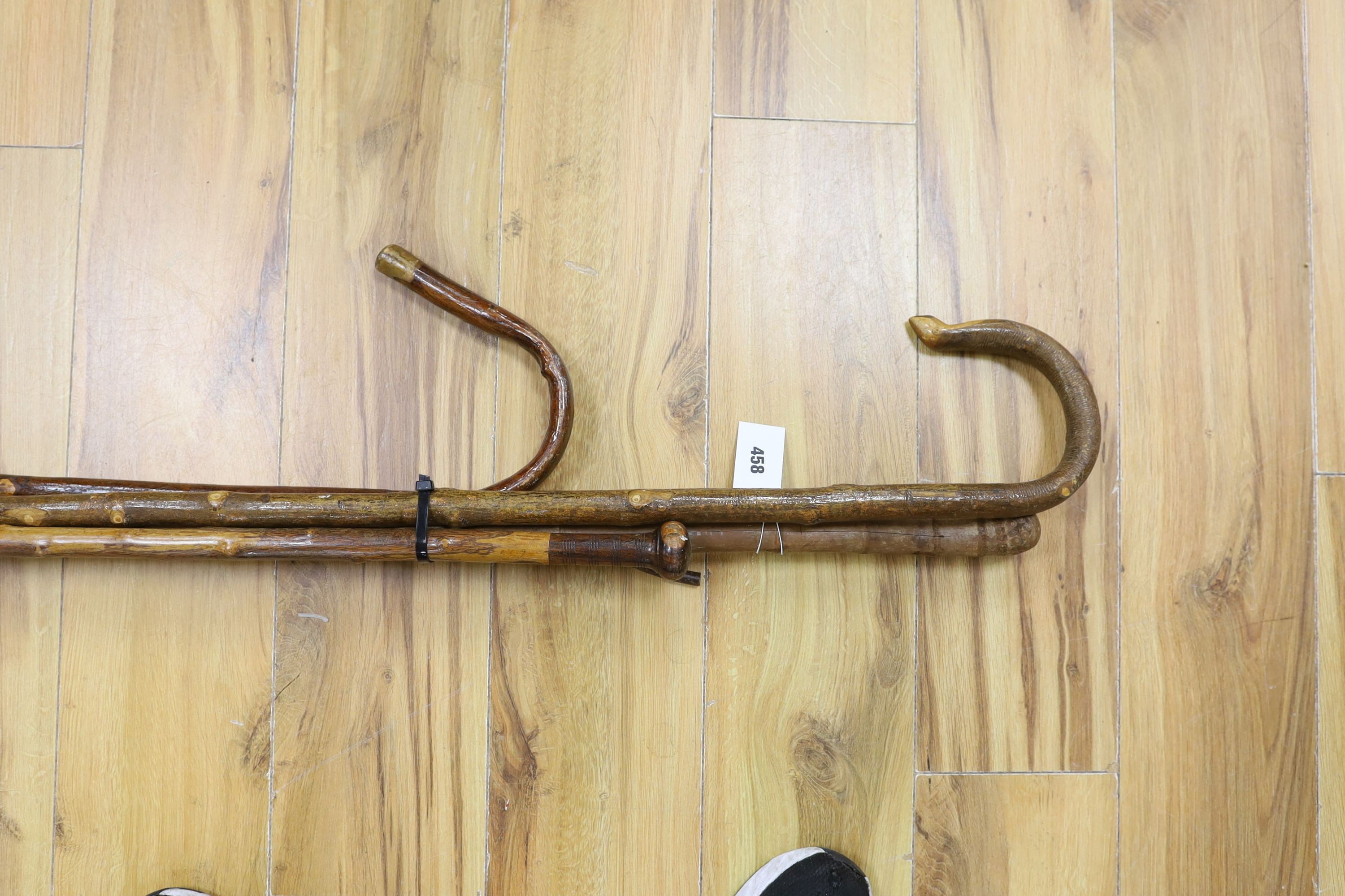 A collection of 5 walking sticks/Shepard's crooks